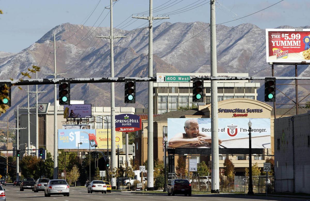 Local business advertising on a busy Salt Lake City street to improve market visibility